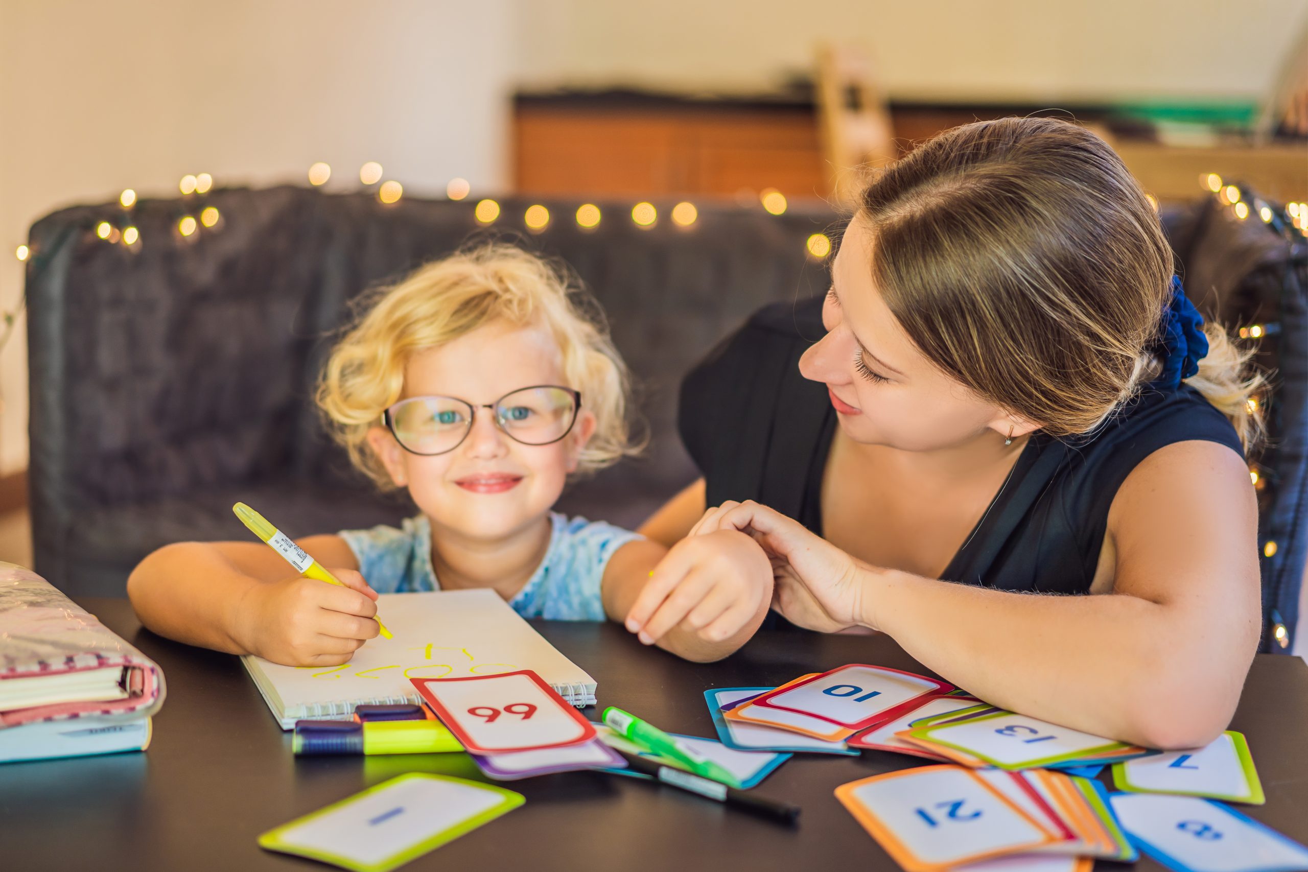 a home dyslexia Tutoring session for a young girl in glasses