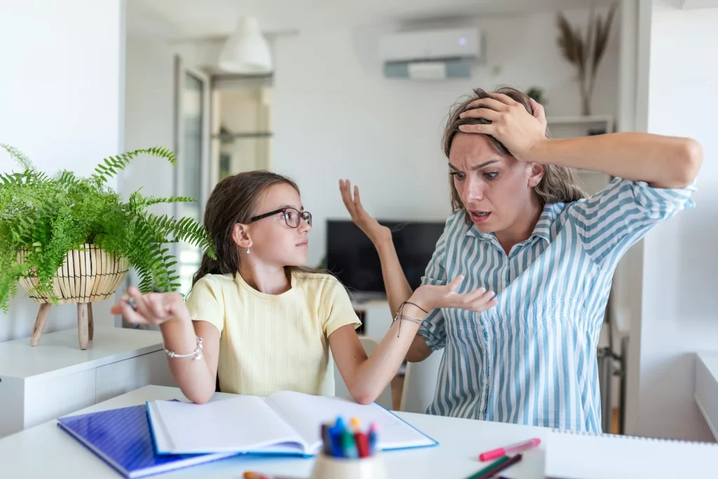 photo - a parent and a child are puzzled as they are attempting to complete home schooling without a knowledgable home school tutor