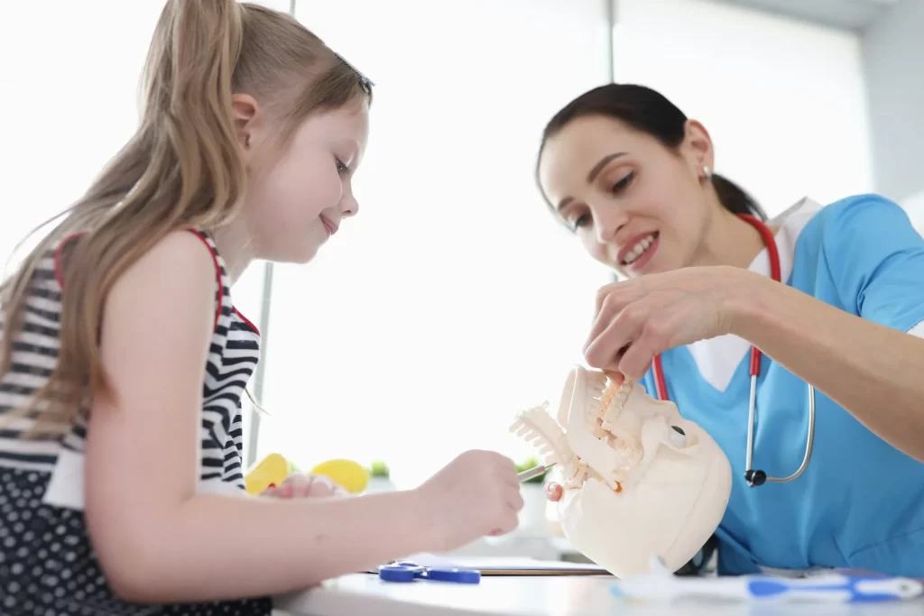 photo - a science tutor and a girl in an alternative provision school setting