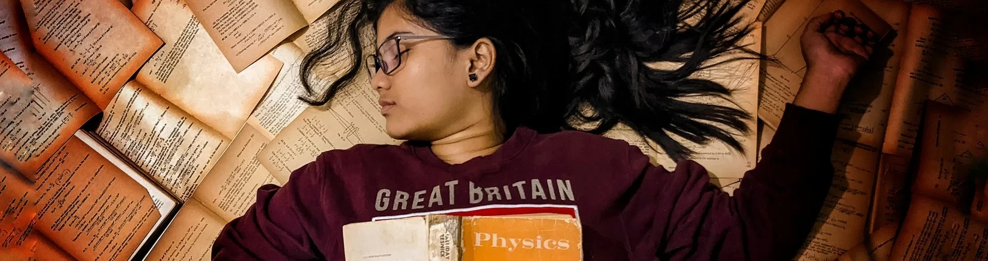 photo - a girl lying down on the floor struggling with being a SEN student