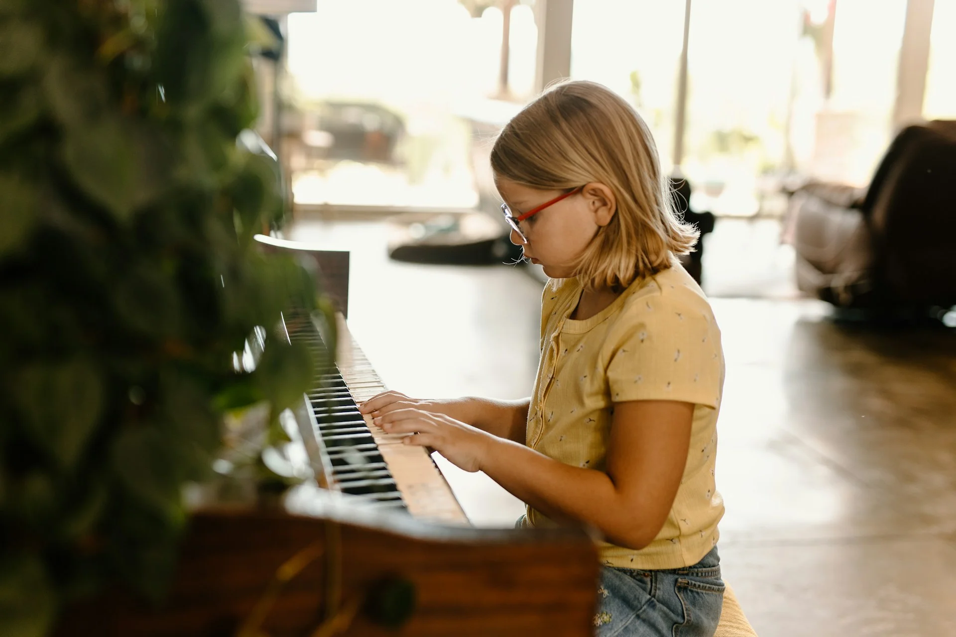 photo - SEN or SEND child playing piano 