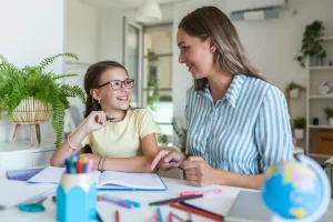 photo - a SEN student with a tutor on an inclusive education autism session