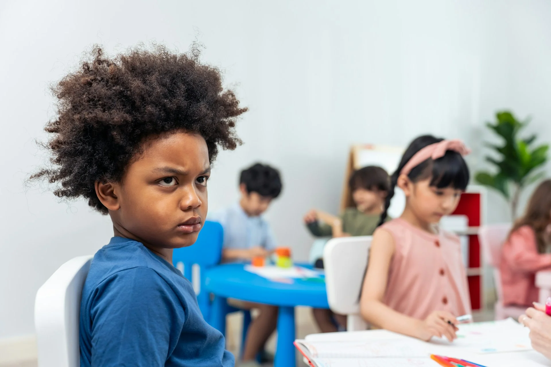 photo - an angry adhd child in school