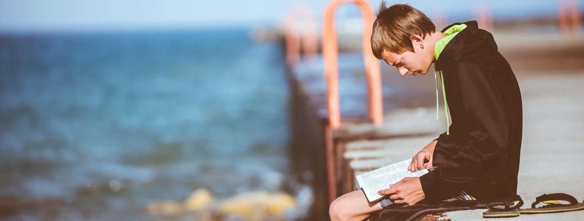 photo - a boy reading about what is a sen register