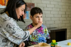 photo - a mother and her child doing a sensory overload test