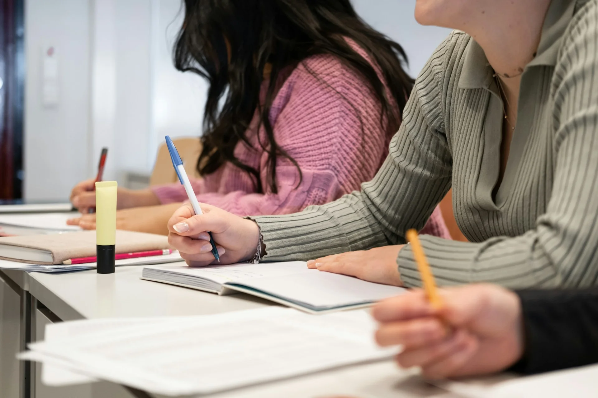 photo - two girls preparing for exams, wondering what happens if you fail your gcse