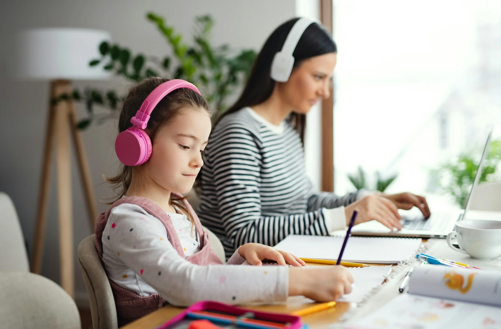 photo - a mother and her daughter are working during the girl's homeschooling hours using her grants for homeschooling special needs uk