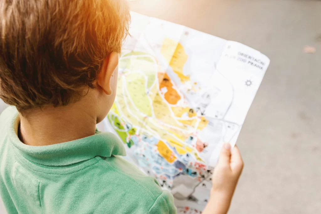 Photo - Boy looking at a colourful map with Children's Events London