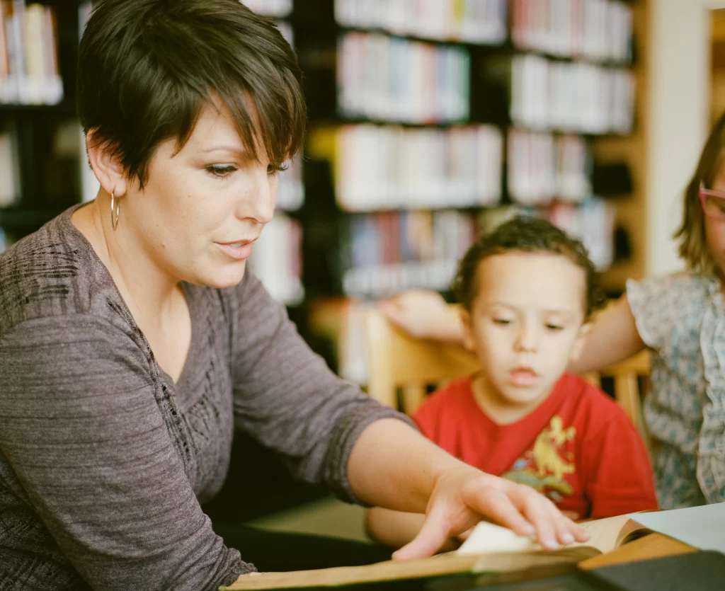 Photo - Women with little boy conducting an EHCP for dyslexia assessment