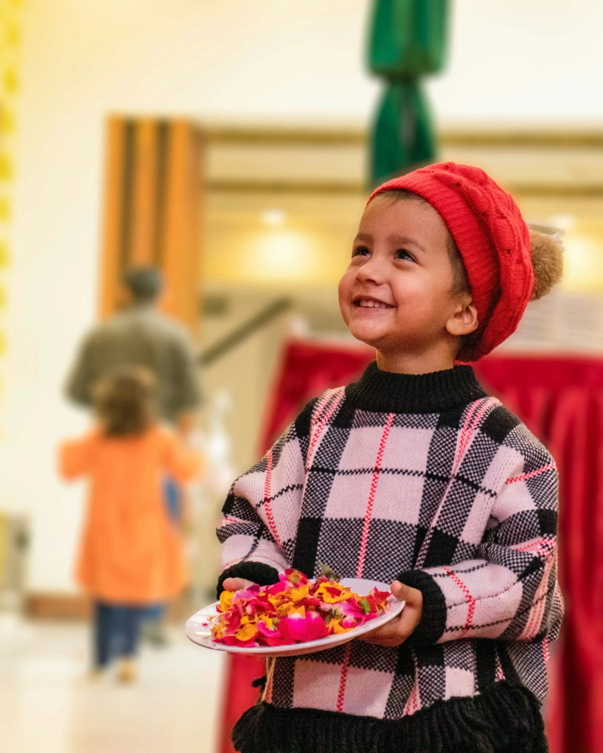 photo - a happy toddler smiling at a museum