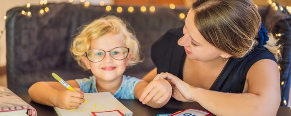 a home dyslexia Tutoring session for a young girl in glasses