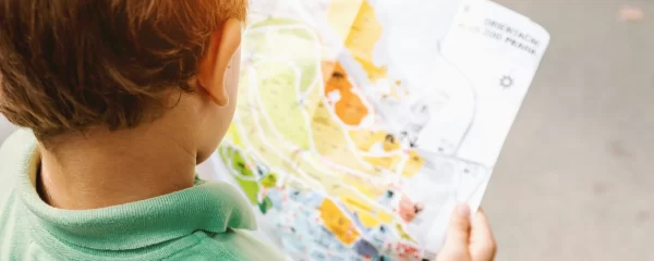 Photo - Boy looking at a colourful map with Children's Events London