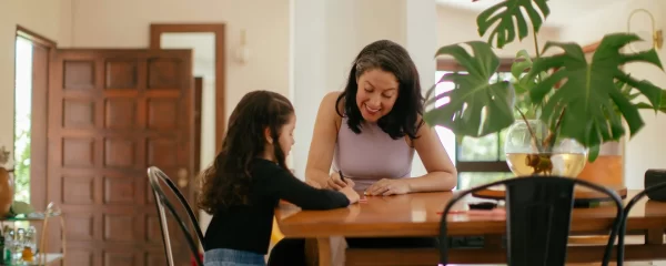 photo - a sen student with a SEN tutor on UK tutoring prices