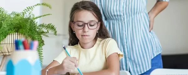 photo - a girl with meares Irlen syndrome reading