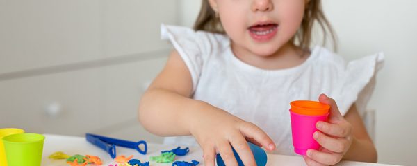 child learning colors while playing